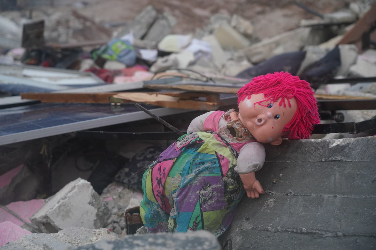 Toys buried in the rubble of destroyed buildings after earthquake in Afrin District, Aleppo Governorate, northwest Syria