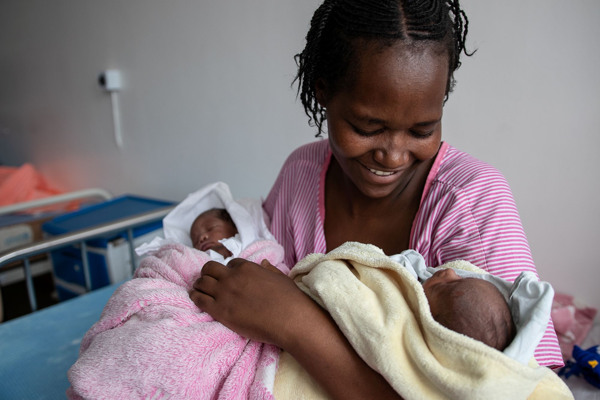 Mother jasmine holds her newborn twins 2 weeks in a hospital in kenya